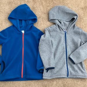 Two zip-up fleece hoodies